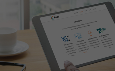 A tablet showing the Kivuto website's compliance standards